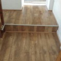 oak laminate floor fitted by us at Stores 4 Floors