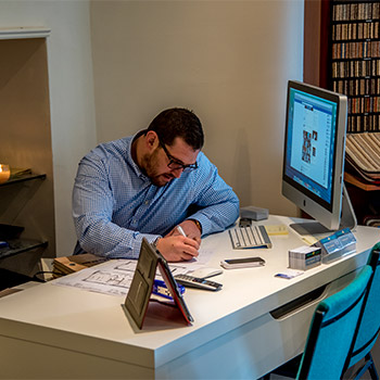 sales staff working on flooring requirements from a client